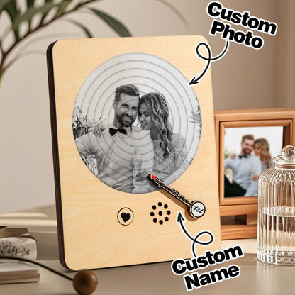 Scale comparison showing 6.2in x 8.2in personalised wooden record player beside everyday items for size reference