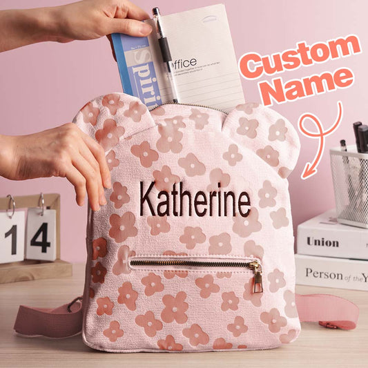 Front view of personalised name embroidered mini flower backpack in canvas — custom canvas school bag for kids, compact 26×13×28cm