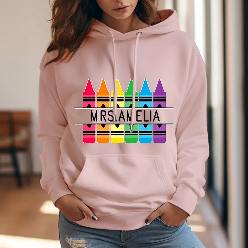 Back view of personalised crayon hooded sweatshirt showing relaxed fit — simple reverse for comfortable school and classroom use
