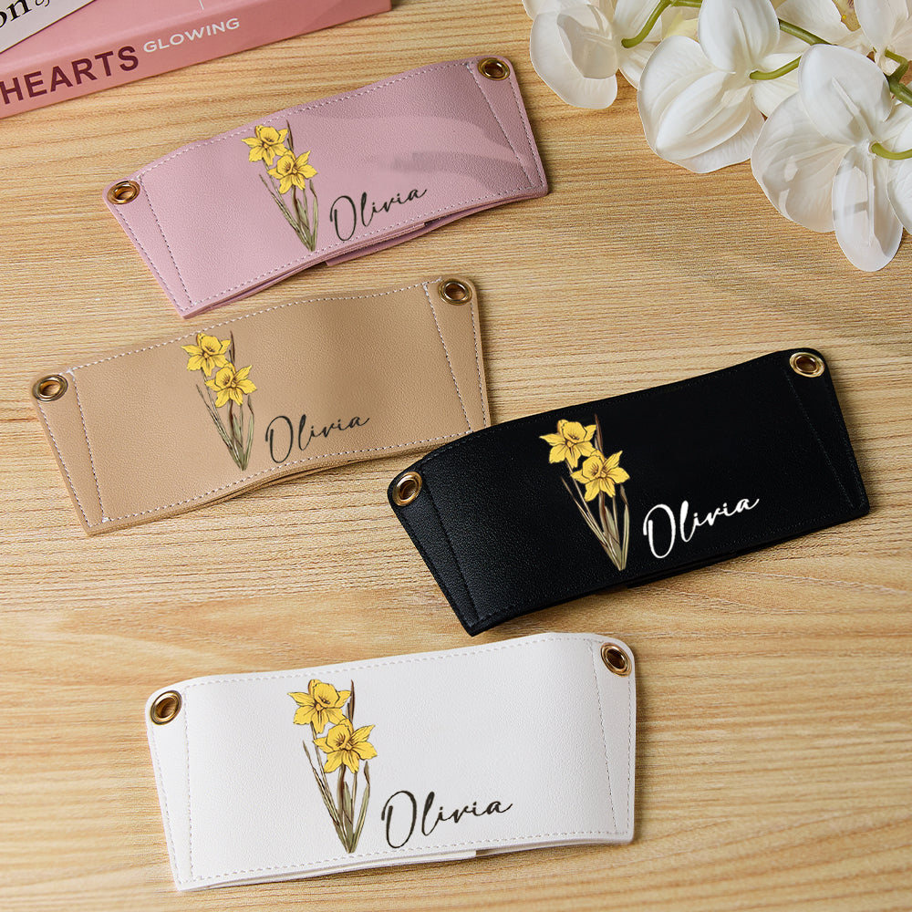 Interior view and wipe-clean PU leather finish of a personalised birth flower water bottle carrier for 40oz Stanley