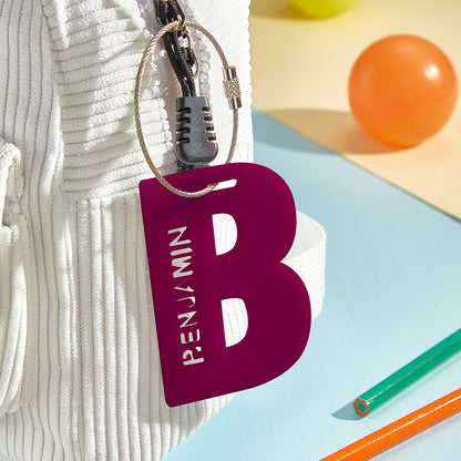Packaged personalised acrylic name tag ready as a thoughtful back-to-school gift, neat presentation and protective packaging