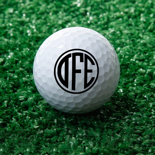 Personalised monogram golf ball with custom UV-printed initial — durable rubber, wind‑tunnel dimple surface for longer, more stable flight