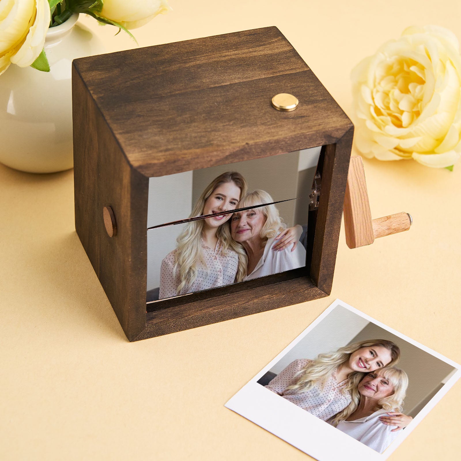 Front view showing eight personalised photos arranged in a vintage-style flipbook frame.