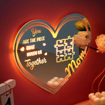 You Hold Us Together puzzle sign mounted on a wall — mirror-finish personalised gift for Mum