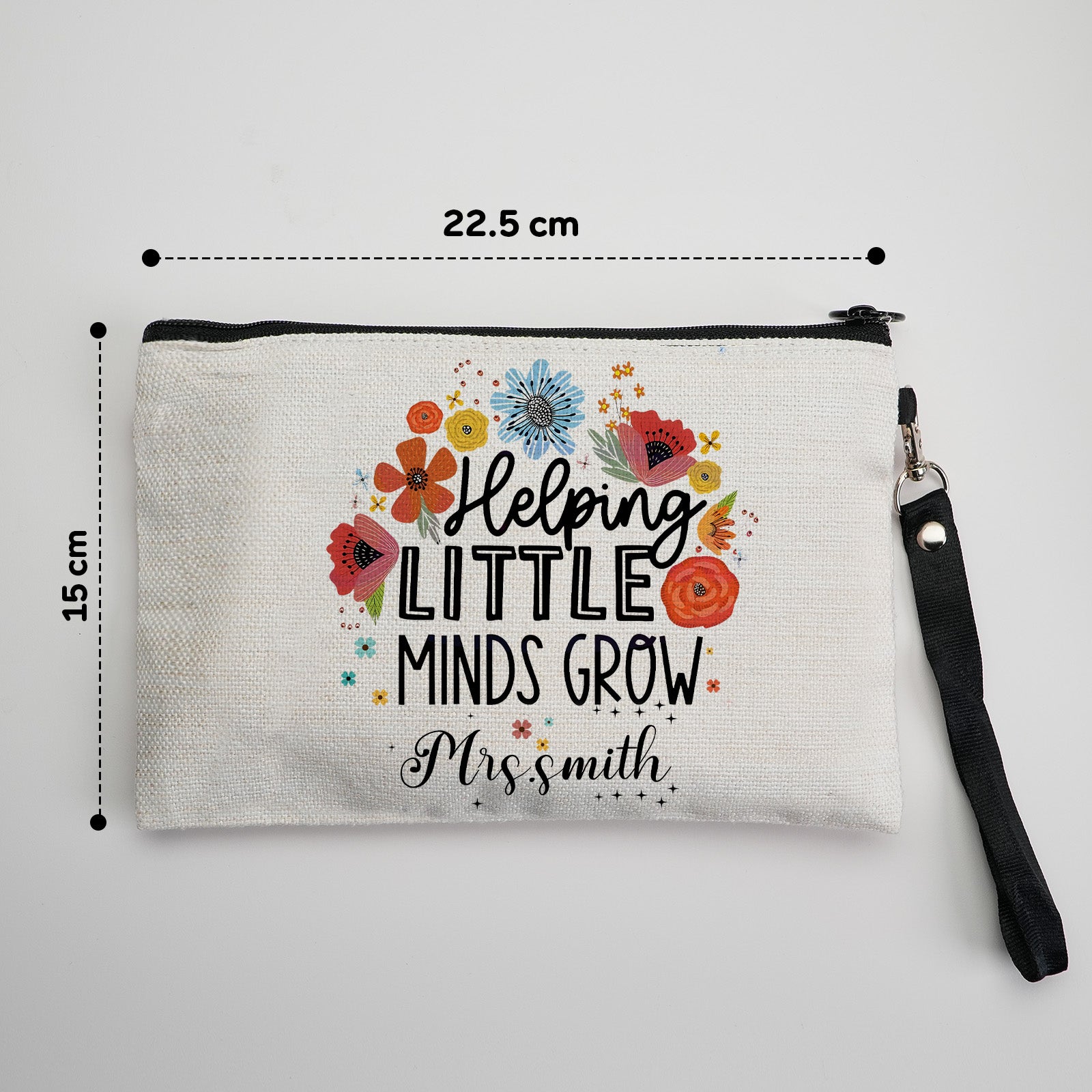 Personalised canvas pouch with name shown beside pens and make-up brushes – versatile everyday clutch