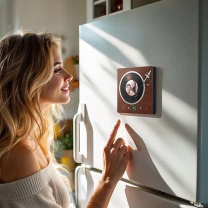 FridgeBeats Framed 4.0 beside a coffee cup to show compact 10cm size — personalised music fridge magnet lifestyle shot