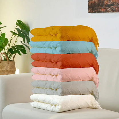 Decorative tassels along the edge of the personalised kids blanket.