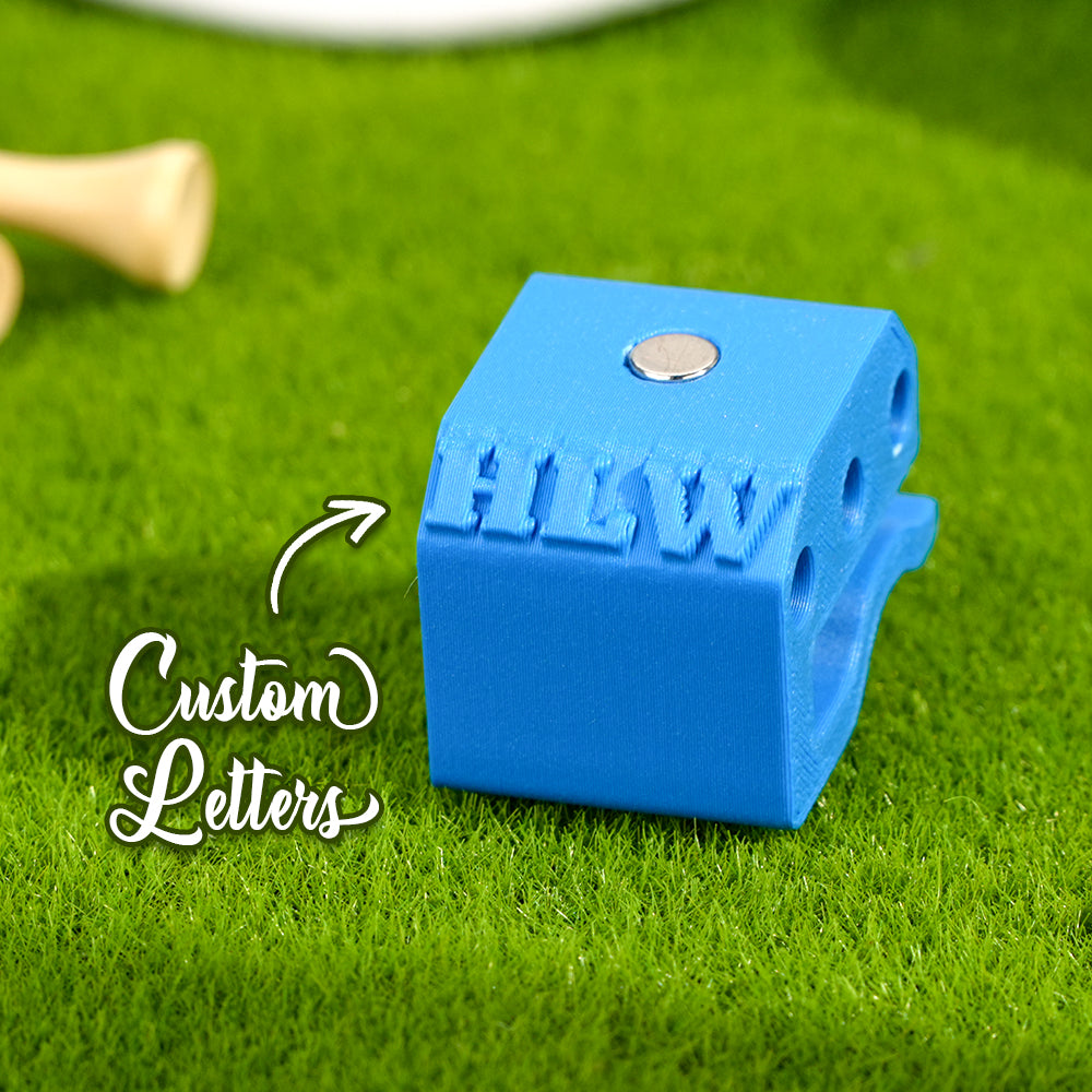 Golfer wearing a cap with a personalised magnetic ball marker hat clip in use — quick-access tees holder for the course