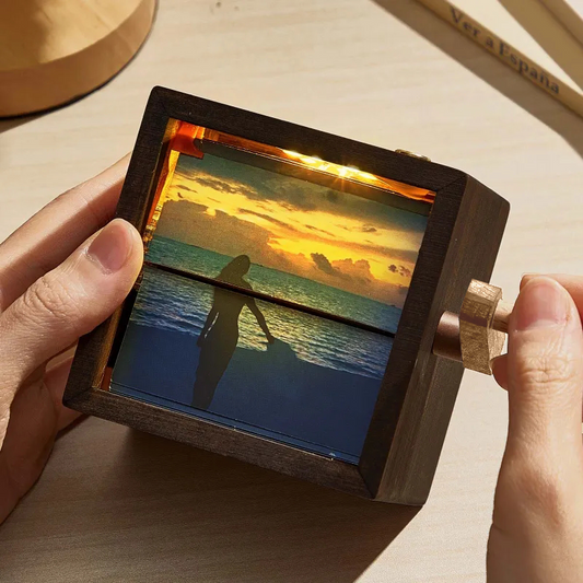 Personalised hand-cranked photo flipbook frame displaying an animated photo sequence with built-in light — ideal custom anniversary gift