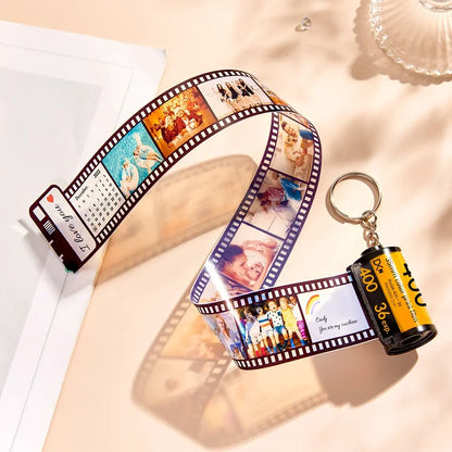 Close-up of personalised camera roll keyring showing high-definition printed images and solid metal key ring – custom photo keychain