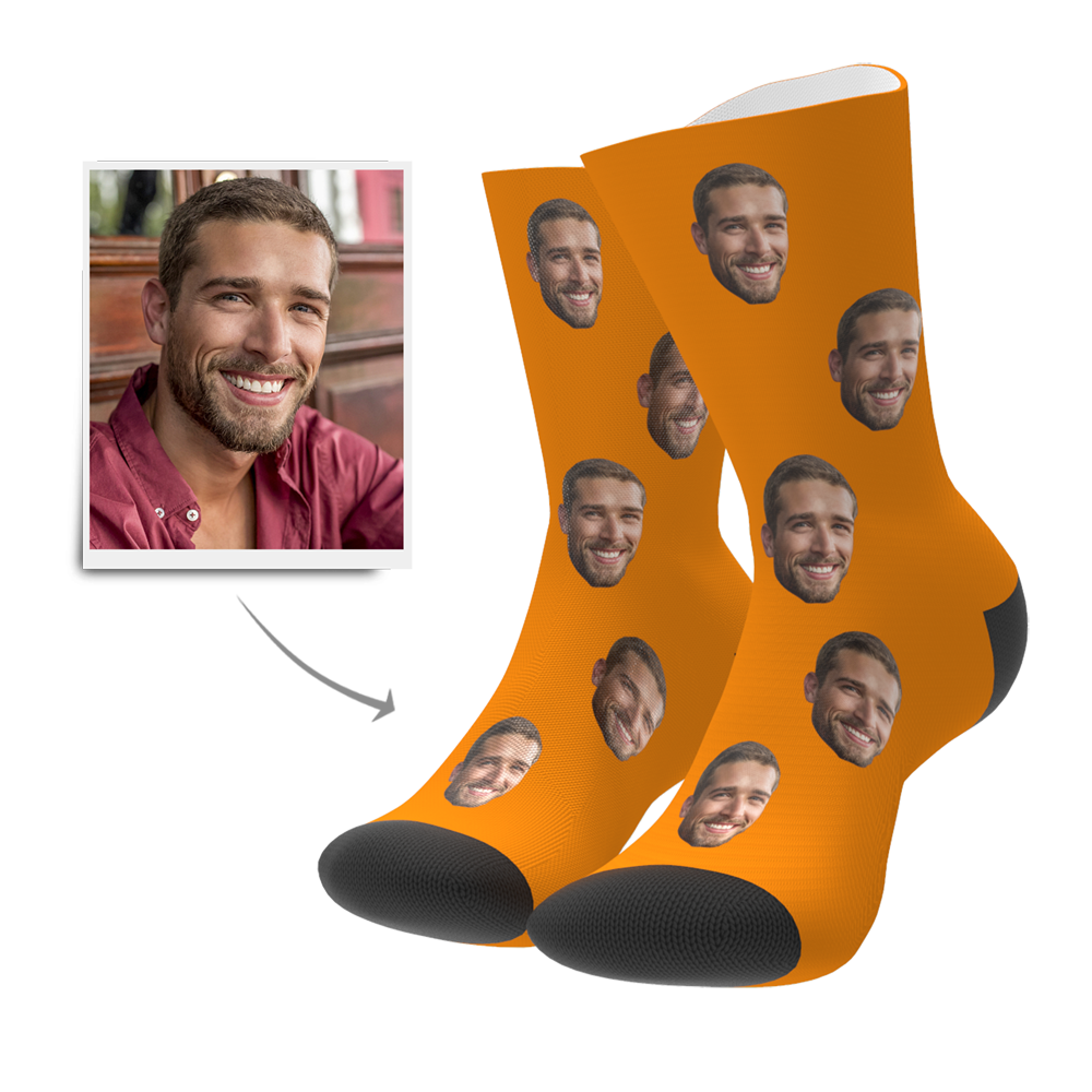 Pair of personalised photo socks showing custom face print — high-quality heat-transfer, available in ten colours