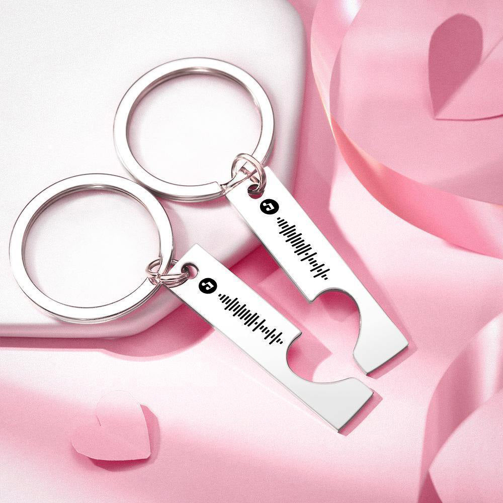 Personalised stainless steel keyring with heart cut-out and engraved Spotify code hanging from keys – everyday carry keychain gift