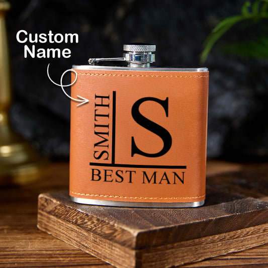 Front view of personalised name 6oz stainless steel whisky flask with brown PU leather wrap and engraved name - premium personalised gift for him