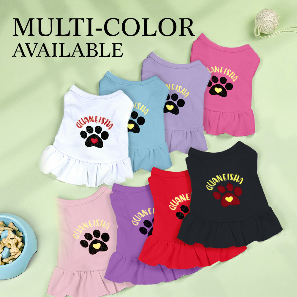 Personalised embroidered cotton pet dress modelled on a small dog — comfortable everyday and party outfit, personalised name detail