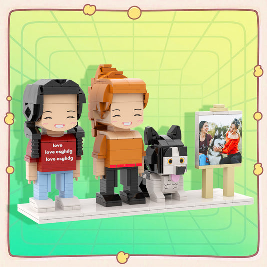 Framed custom full‑body personalised brick figures of two people and a dog on a white background — ideal anniversary and birthday gift keepsake