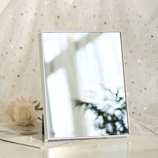 Close-up of the illuminated moon phase display inside the glass frame of the Moon Phase Light Box Mirror