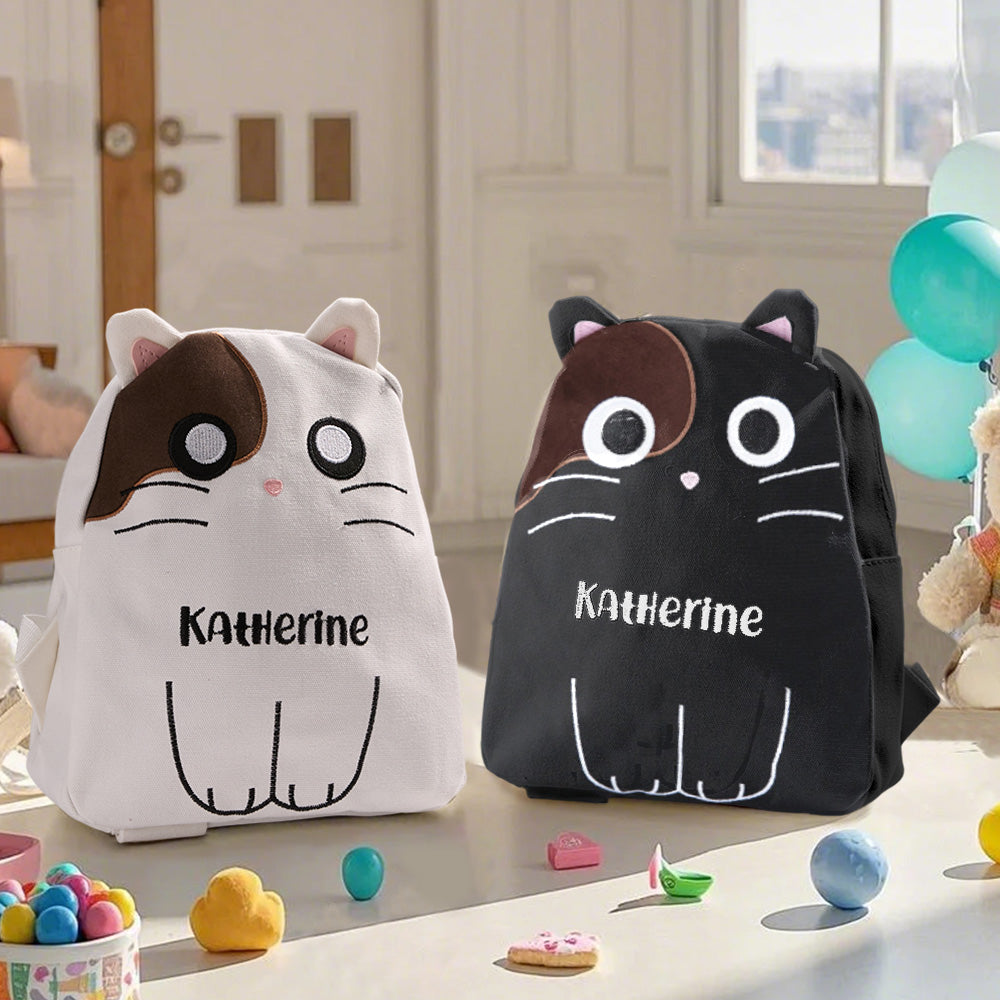 Front view of personalised name embroidery cat backpack for kids — canvas custom school bag with cute cat motif and secure zip