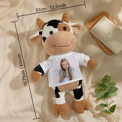 Child hugging personalised cow plush 31 x 40 cm to show huggable size — ideal birthday or Christmas personalised photo gift