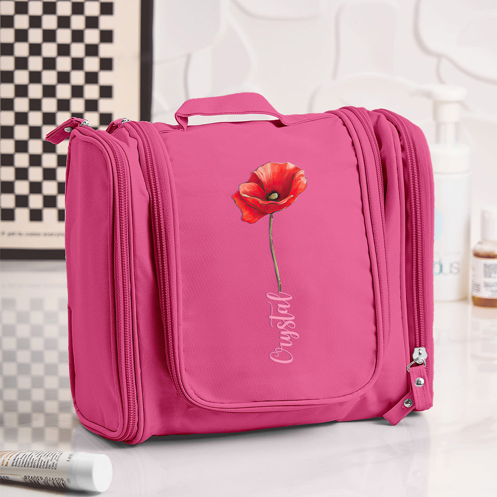 Flat-lay of personalised waterproof toiletry bag with travel cosmetics and toiletries — versatile travel and gym wash bag