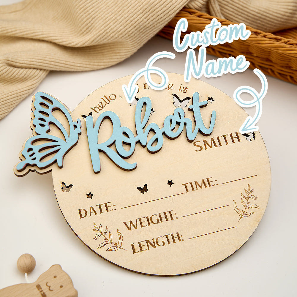 Rear and edge view of personalised wooden butterfly birth announcement sign showing lightweight construction and smooth edges, ideal for photos and display