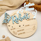Rear and edge view of personalised wooden butterfly birth announcement sign showing lightweight construction and smooth edges, ideal for photos and display