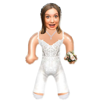 Lifestyle shot of a bride blow-up doll used as a humorous party prop at a bachelorette/wedding celebration.