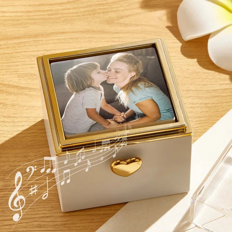 Flip-open view of personalised music box candle with visible DC charging port and automatic MP3 playback mechanism — ideal personalised gift