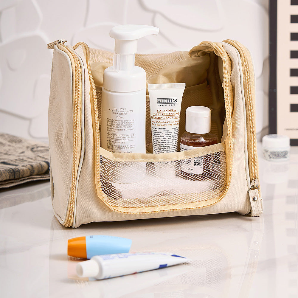 Interior organised with cosmetics in pockets of personalised birth flower toiletry bag — ideal wash bag for travel and everyday use