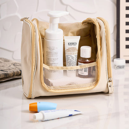 Interior organised with cosmetics in pockets of personalised birth flower toiletry bag — ideal wash bag for travel and everyday use