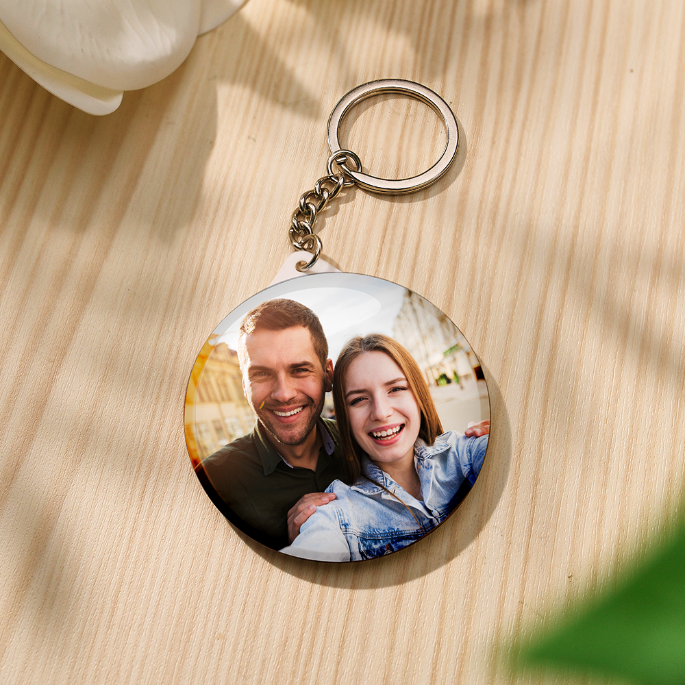 Open view showing the mirror side of the personalised photo keyring reflecting a face – practical compact mirror and sentimental photo gift for her