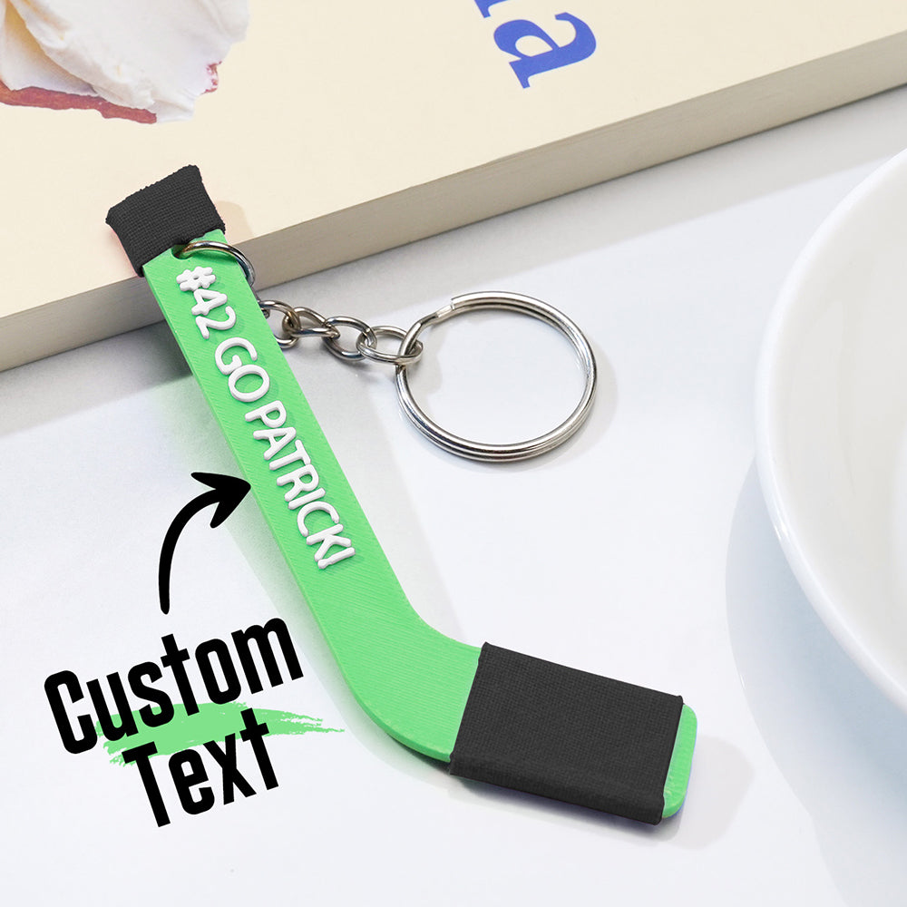 Detail shot of the keyring attachment and durable PLA construction on a personalised tiny hockey stick keepsake — sturdy custom keyring