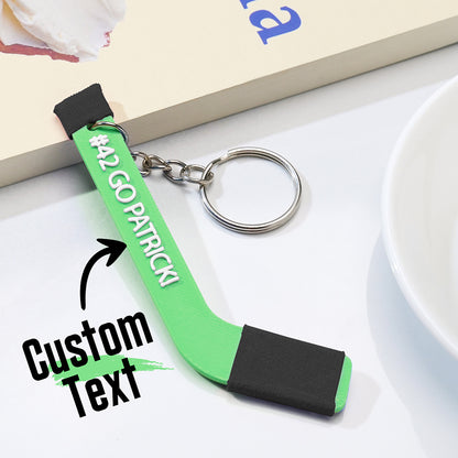 Detail shot of the keyring attachment and durable PLA construction on a personalised tiny hockey stick keepsake — sturdy custom keyring