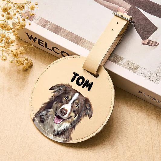 Round personalised pet portrait luggage tag on white background showing a printed pet portrait and name on PU leather — personalised pet luggage tag, round pet portrait tag