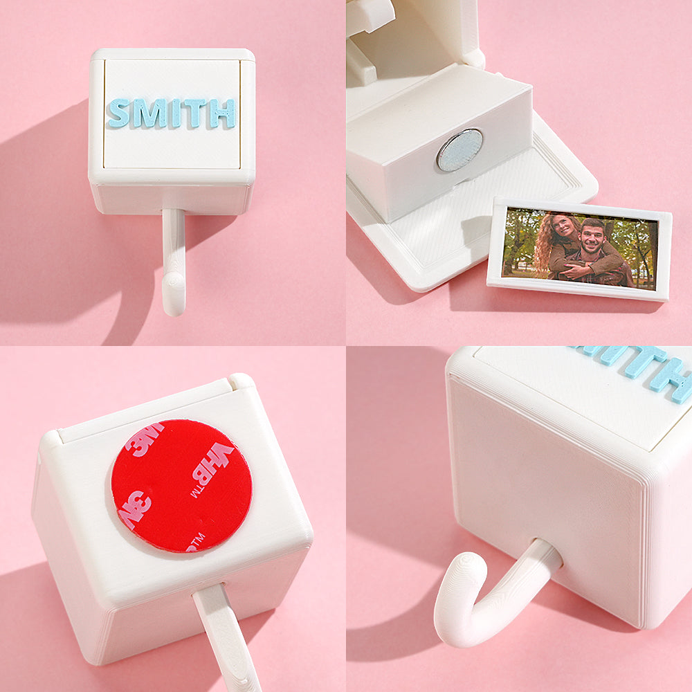 Gallery of personalised 3D printed gravity hooks mounted on a hallway wall holding keys and coats — stylish, practical home decor and ideal housewarming or teacher gift