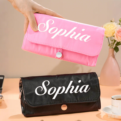 Detail of zip and stitching on personalised birth flower make-up brush bag, showing durable nylon construction and neat custom print