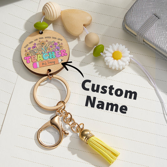 Personalised flower beaded lanyard 45 cm with engraved wooden disk, silicone beads, tassel and metal key ring — ideal teacher thank-you gift