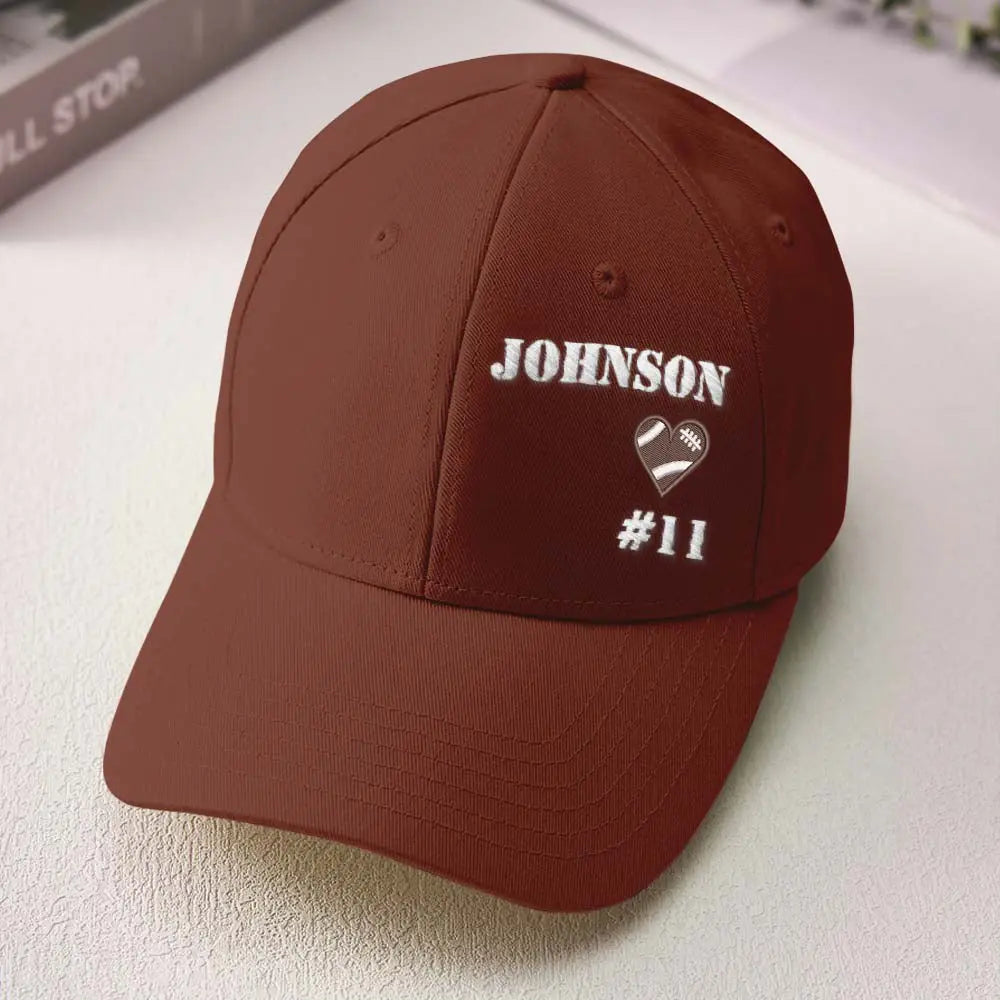 Rear view of personalised football team cap showing adjustable strap and neat stitching on a custom baseball hat