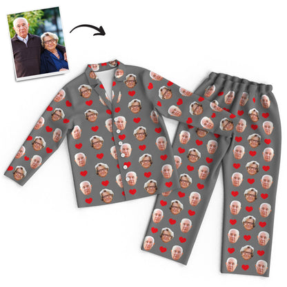 Folded personalised pyjama set highlighting elasticated waistband and buttoned top — bespoke photo pyjamas, great personalised gift for family and friends
