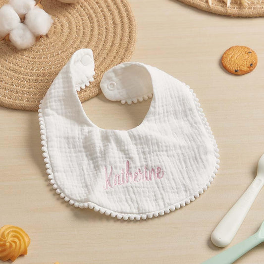 Personalised baby bib with embroidered name on soft absorbent cotton — perfect newborn gift and keepsake