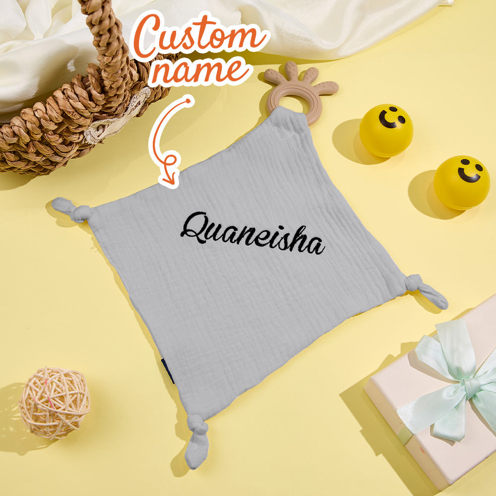 Folded Personalised Soothe Towel displaying delicate embroidered name and breathable cotton texture – ideal newborn sleep comforter