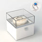 Side view highlighting the weighted copper construction of the rotating Bear Cake Ring Box for stable surprise proposals