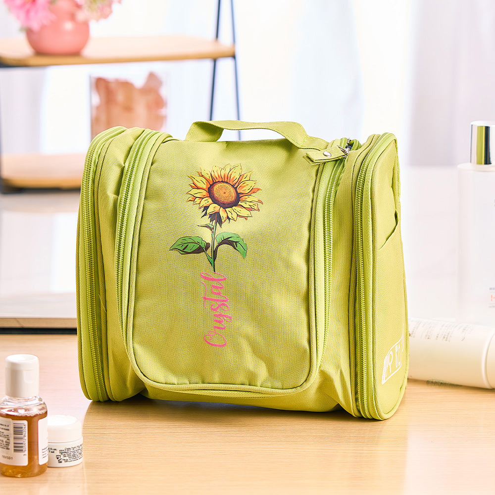 Waterproof Oxford fabric demonstration with water beading on personalised birth flower toiletry bag to protect contents from spills and moisture