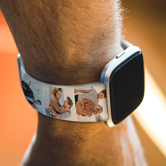 Close-up of a customisable silicone Apple Watch band featuring a printed photograph on the surface.
