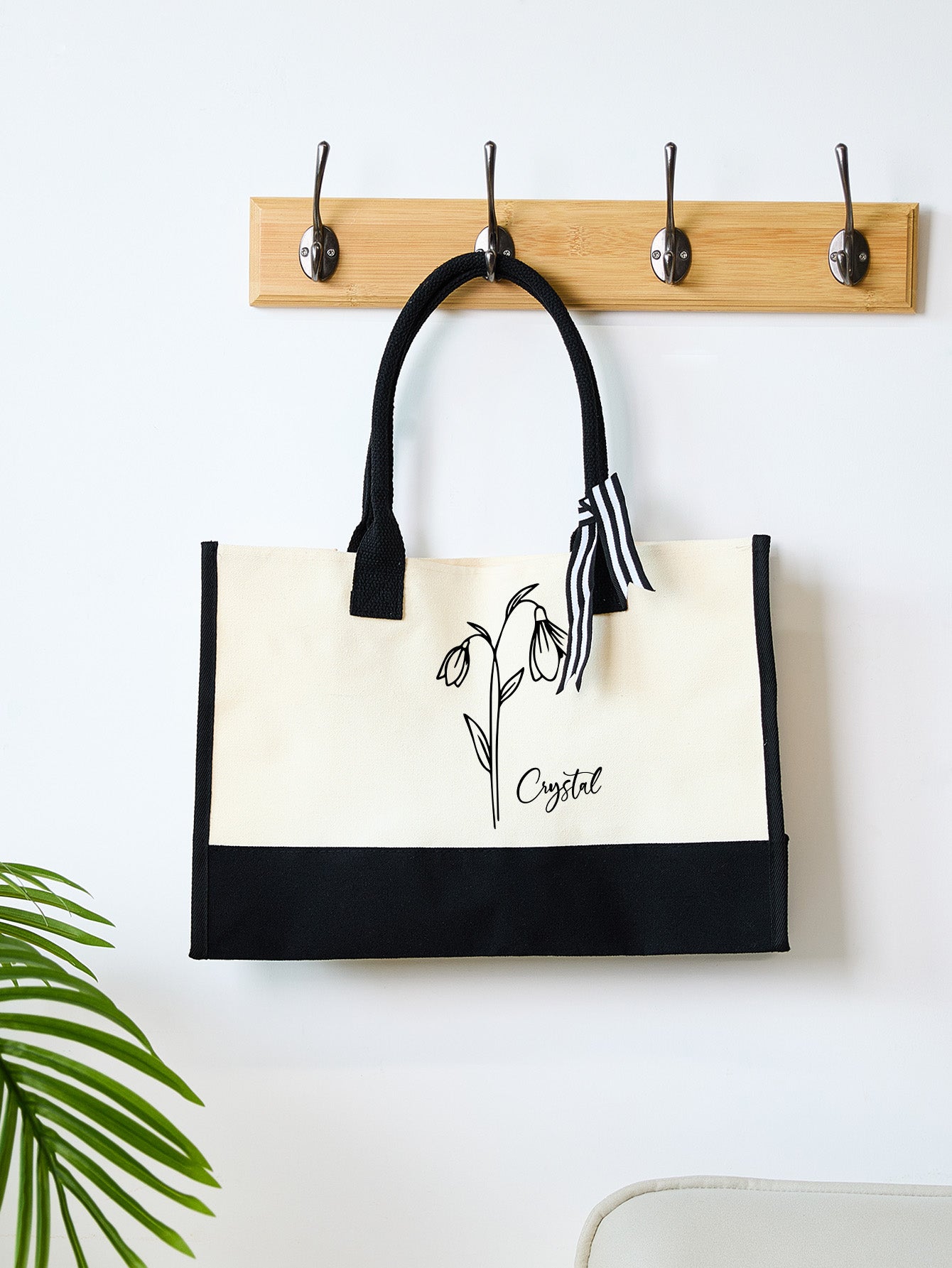 Model carrying personalised canvas tote demonstrating versatile everyday carry and stylish wedding accessory for bridesmaids