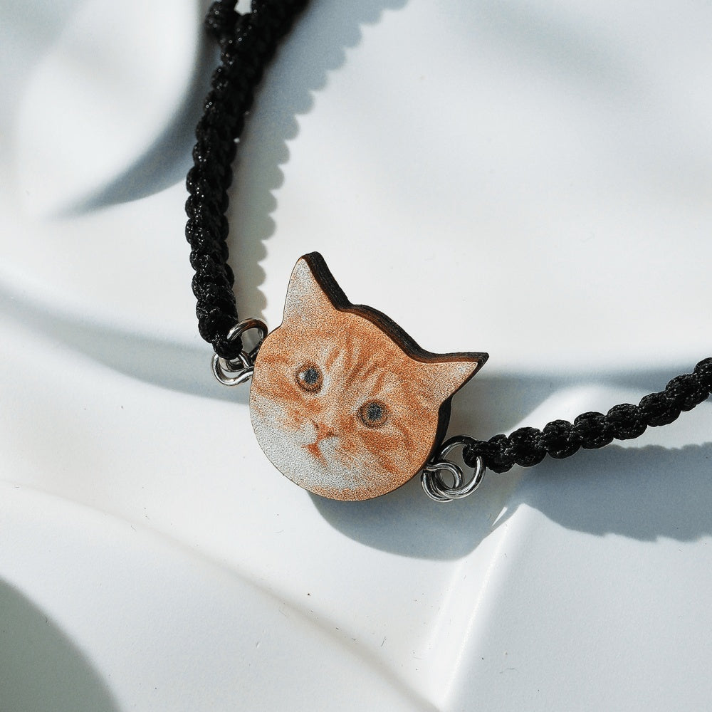 Side angle view of adjustable pet portrait bracelet with rope band
