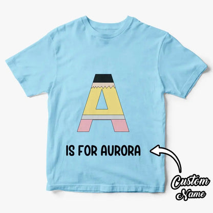 Personalised pencil t‑shirt presented as a gift — custom name printing makes a thoughtful keepsake for school starters