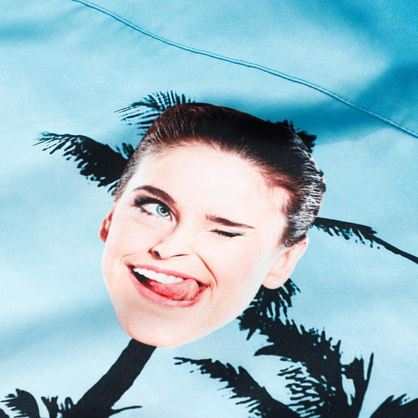 Close-up of heat transfer print on Custom Hawaiian Shirt showing personalised face detail and bright colourfast polyester fabric