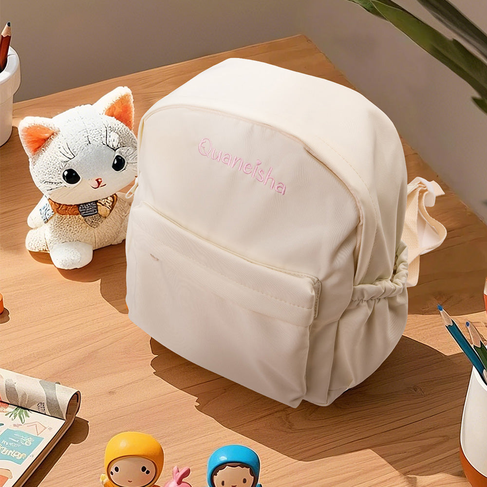 Open interior view of personalised backpack showing practical storage space and internal pocket, perfect for school essentials in a custom kids school bag