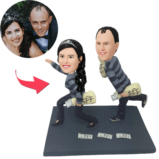 Personalised funny robbers couple bobblehead in hand-sculpted polymer clay with engraved base — custom heads from photos, quirky anniversary or wedding gift