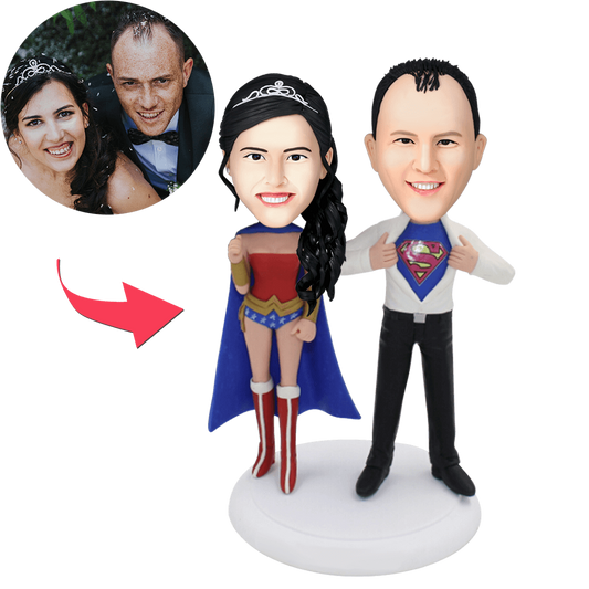 Personalised Superheroes Couple bobblehead with engraved text on base, high‑detail polymer clay collectible featuring customised heads from your photos, ideal anniversary or wedding keepsake